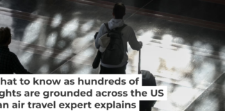 Passengers walk through the Ronald Reagan Washington National Airport on Nov. 7, 2025. Anna Moneymaker/Getty Images